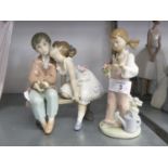 LLADRO PORCELAIN GROUP, YOUNG GIRL KISSING A YOUNG BOY, SEATED ON A BENCH; 7 1/2" (19.1cm) HIGH