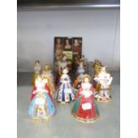 SEVEN MODERN ROYAL WORCESTER PORCELAIN CANDLE SNUFFERS 'HENRY VIII AND HIS SIX WIVES', TOGETHER with