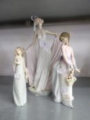 THREE LLADRO PORCELAIN FEMALE FIGURES; ELEGANT LADY WITH ELABORATE HEADDRESS, POSING IN A FULL