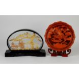 ORIENTAL CARVED CINNABAR LACQUER SMALL PLAQUE, carved lakeland scene with houses and trees, two