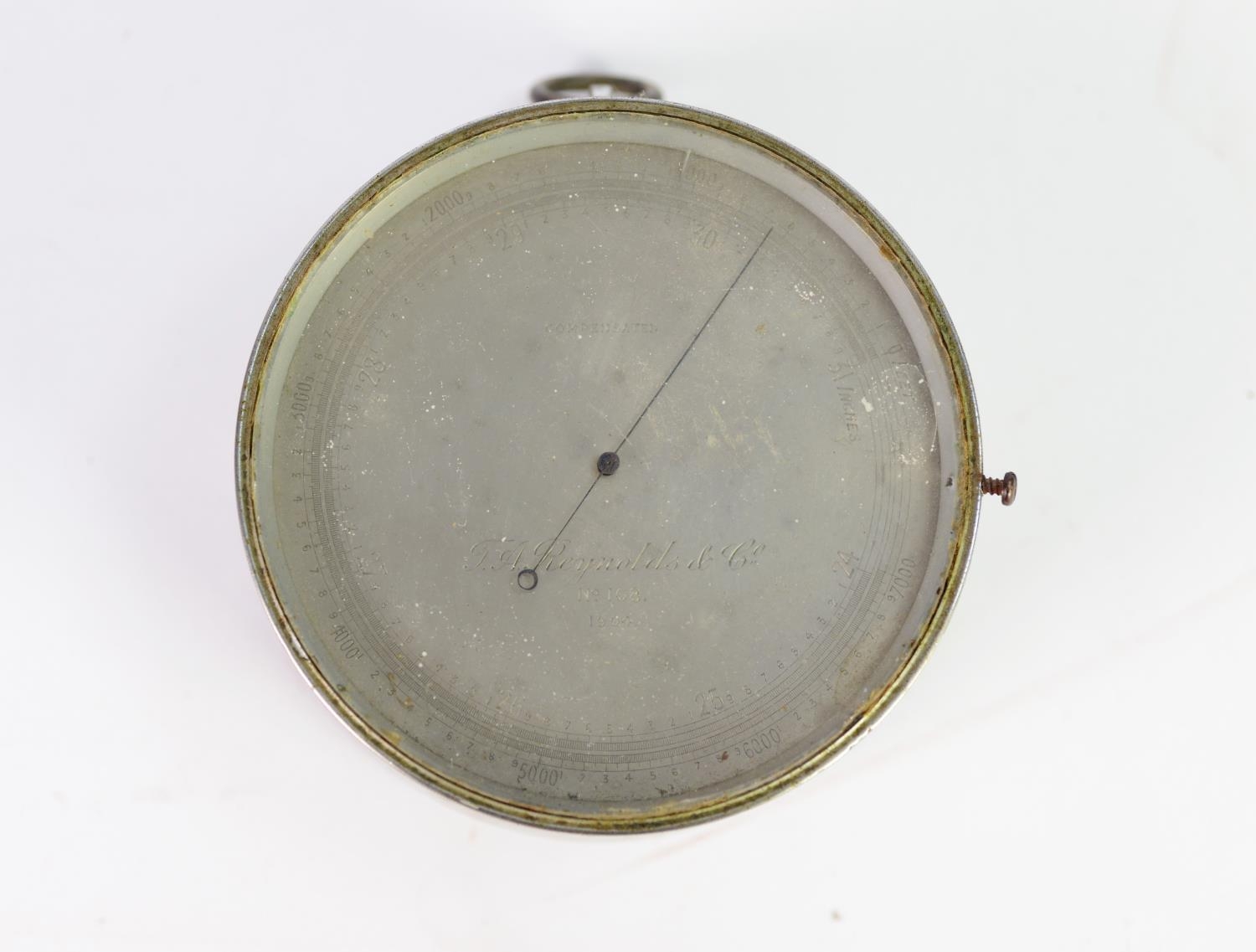 T.A. REYNOLDS WALL MOUNTED COMPENSATED BAROMETER, with silvered dial, 4 ½? (11.4cm) diameter - Image 2 of 2