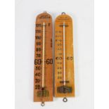 TWO BLONDE WOOD FACTORY THERMOMETERS, one marked for the Factory Act, (2)