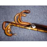 SEVEN VINTAGE WALKING CANES, including one with 18ct gold collar, and another with hallmarked silver