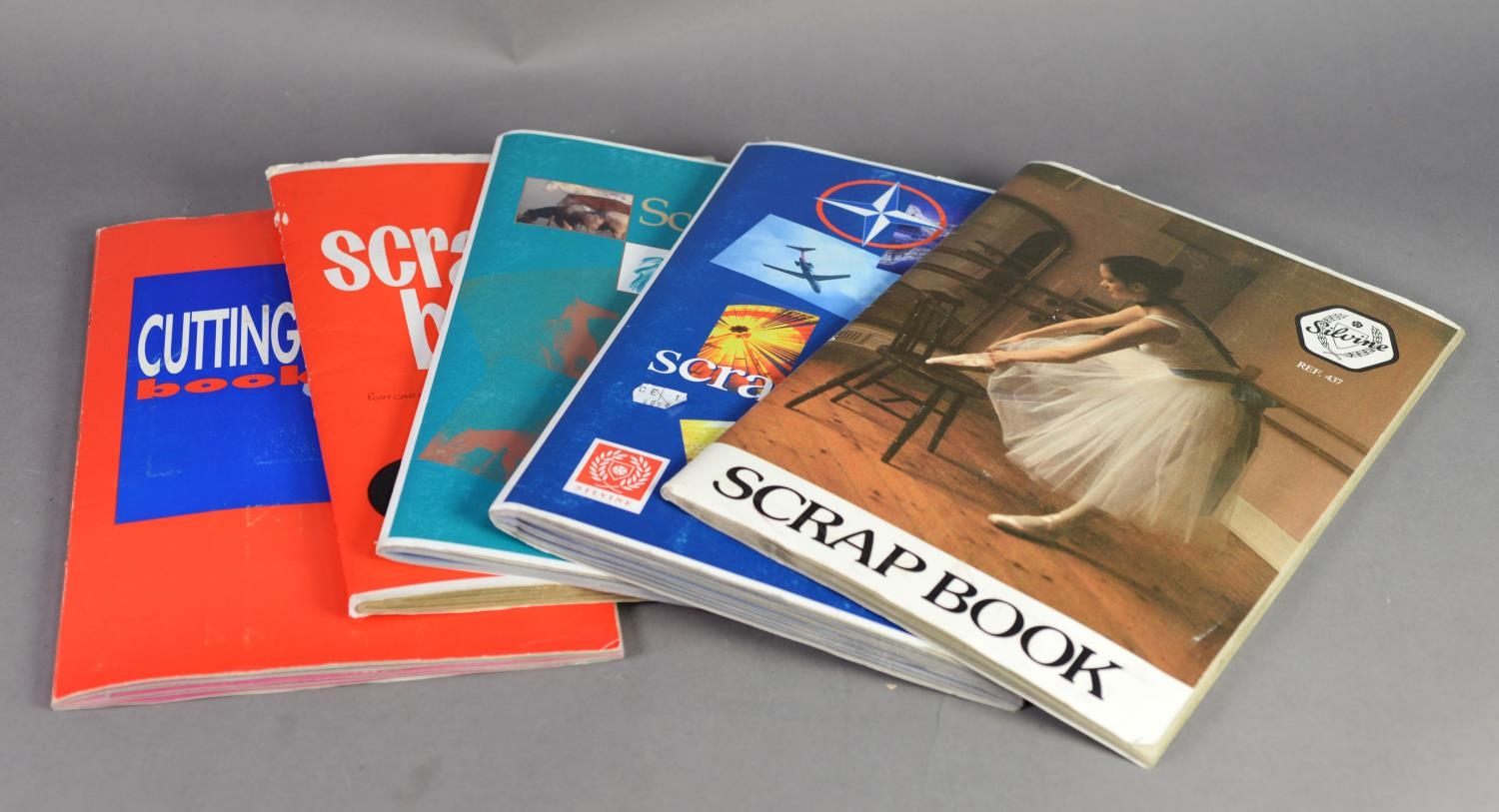 TWELVE PROPRIETARY SCRAPBOOKS CONTAINING A LARGE COLLECTION OF MAINLY POST-WAR POSTCARDS, mainly