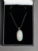 SILVER SNAKE CHAIN NECKLACE and large oval opal PENDANT, 1 1/2in x 7/8in (4 x 2.25cm), in case