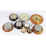 NINE EARLY TWENTIETH CENTURY AND LATER WALL MOUNTED ANEROID BAROMETERS, in circular cases, 3 ½?-
