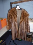 LIGHT BROWN PASTEL MINK MIDI LENGTH COAT, with grey fox fur shawl collar vand fox fur deep cuffs,