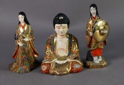 TWO PRE-WAR JAPANESE SATSUMA FIGURE OF WOMEN, in multi-coloured costume, one holding a large