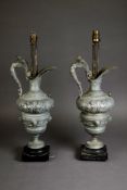 PAIR OF EARLY TWENTIETH CENTURY CLASSICAL EWER FORM CAST WHITE METAL TABLE LAMPS, formerly