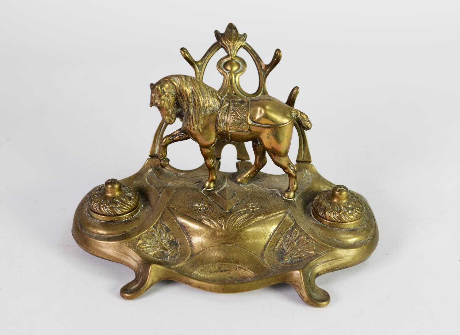 EARLY TWENTIETH CENTURY BRASS DESK INKSTAND, modelled with a horse and a pair of inkwells with - Image 2 of 2