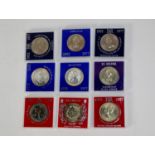 EIGHT SILVER JUBILEE 1977 CROWN COINS from various Commonwealth countries, each in a plastic