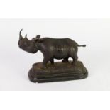 PATINATED BRONZE MODEL OF A RHINOCEROS, SIGNED JULIE MOIGNIEZ, on a moulded black veined marble