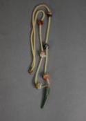 NECKLACE with green tusk shaped jade pendant