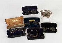 TWO PAIRS OF EARLY 20th CENTURY GILT WIRE FRAMED SPECTACLES (one pair lacks lenses); TWO OTHER PAIRS