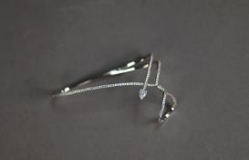 APM, MONACO, POLISHED SILVER AND CRYSTAL SET LOOP AND HEART SHAPED SCARF RING