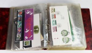 RED RING BINDER CONTAINING 54 CIRCA 1980s FIRST DAY COVERS, together with ROYAL MAIL MINT SETS, each