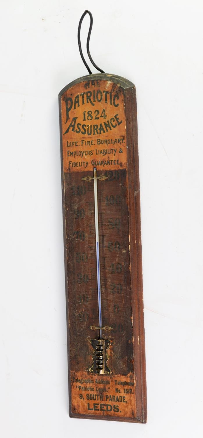 ?PATRIOTIC ASSURANCE? WALL MOUNTED STAINED FRUITWOOD THERMOMETER, 21? (53.3cm) high