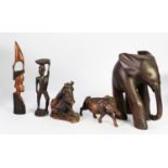 TWO WELL CARVED WOOD MODELS OF WILD BOARS, one modelled standing, the other seated, together with