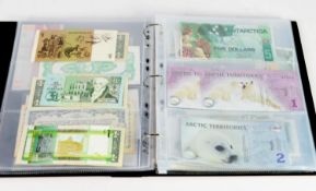 RING BINDER CONTAINING A GOOD SELECTION OF WORLD BANK NOTES, late 20th Century to early 21st