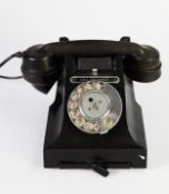 VINTAGE BLACK CRADLE TELEPHONE with 'Call Exchange' label above the dial, small pull-out slide to