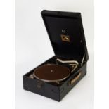 HMV PORTABLE SPRING DRIVEN TABLE TOP RECORD PLAYER in black fabric case, with key and winding