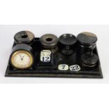 SEVEN PIECE EBONY DRESSING TABLE SET, including two jars and covers with engraved hallmarked