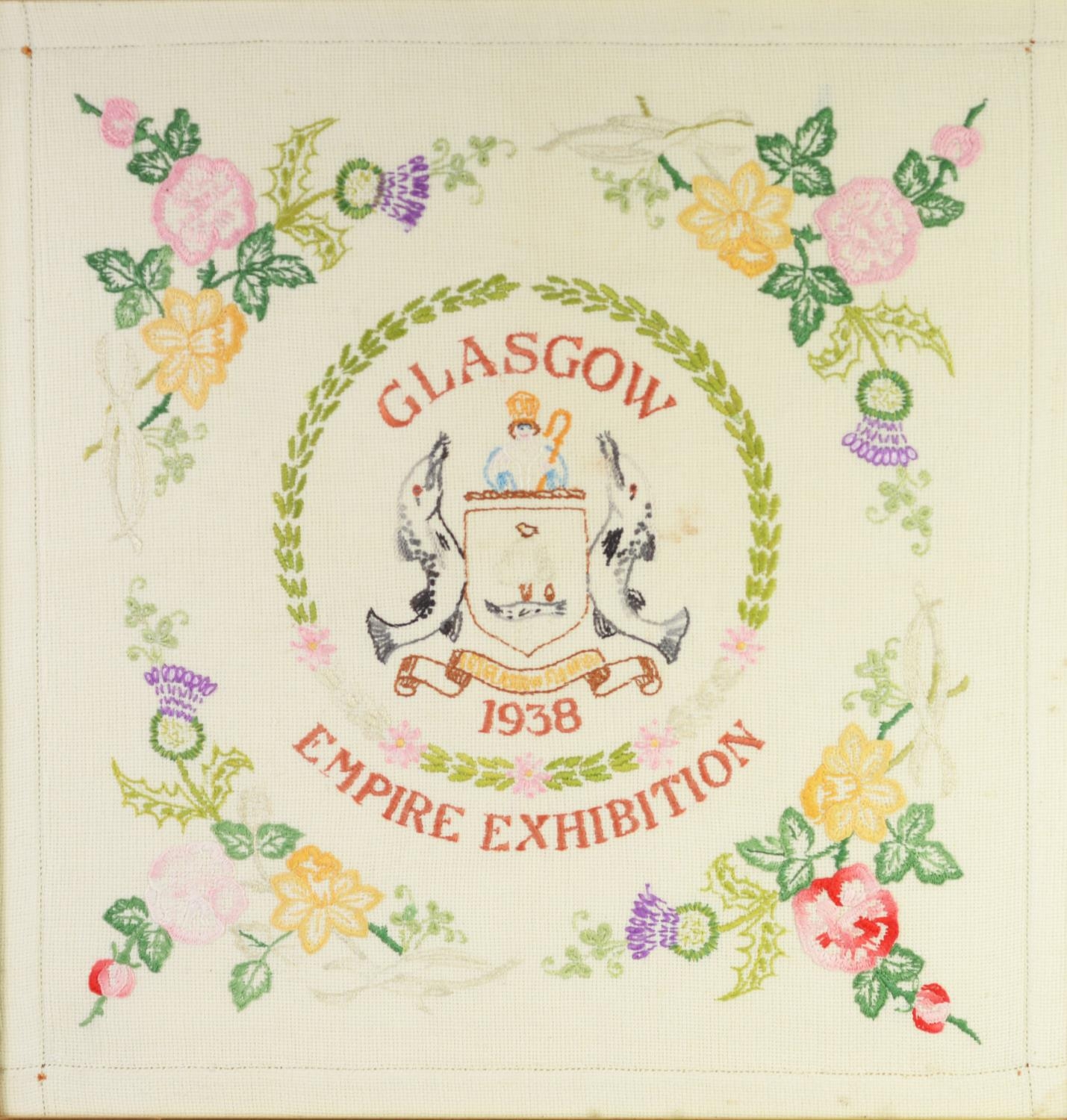 NEEDLEWORK SAMPLER GLASGOW EMPIRE EXHIBITION 1938, centred with a representation of the coat of