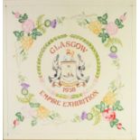NEEDLEWORK SAMPLER GLASGOW EMPIRE EXHIBITION 1938, centred with a representation of the coat of