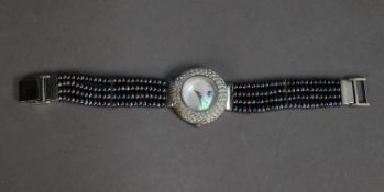 ULTIMA EDIZIONE LADY’S STERLING SILVER QUARTZ WRISTWATCH, with circular blank mother of pearl