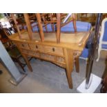 CHINESE LIGHT HARDWOOD DRESSING TABLE, WITH RAFFIA PANELLED TOP AND FRONTS TO THE THREE SMALL FRIEZE