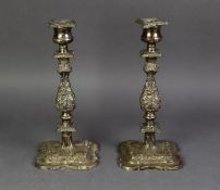 PAIR OF ELECTROPLATED TABLE CANDLESTICKS, each with ornate cast square baluster stem, urn shaped