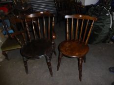 SET OF SEVEN EARLY TWENTIETH CENTURY STAINED WOOD SPINDLE AND STICK BACK CHAIRS (6 + 1), HAVING