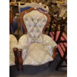 A SHOW WOOD FRAMED VICTORIAN STYLE EASY ARMCHAIR, COVERED IN WHITE ON GREY EMBROIDERED FABRIC