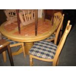 A SET OF FOUR BLOND WOOD KITCHEN SINGLE CHAIRS, WITH RAIL BACKS AND A LIGHT OAK CIRCULAR KITCHEN