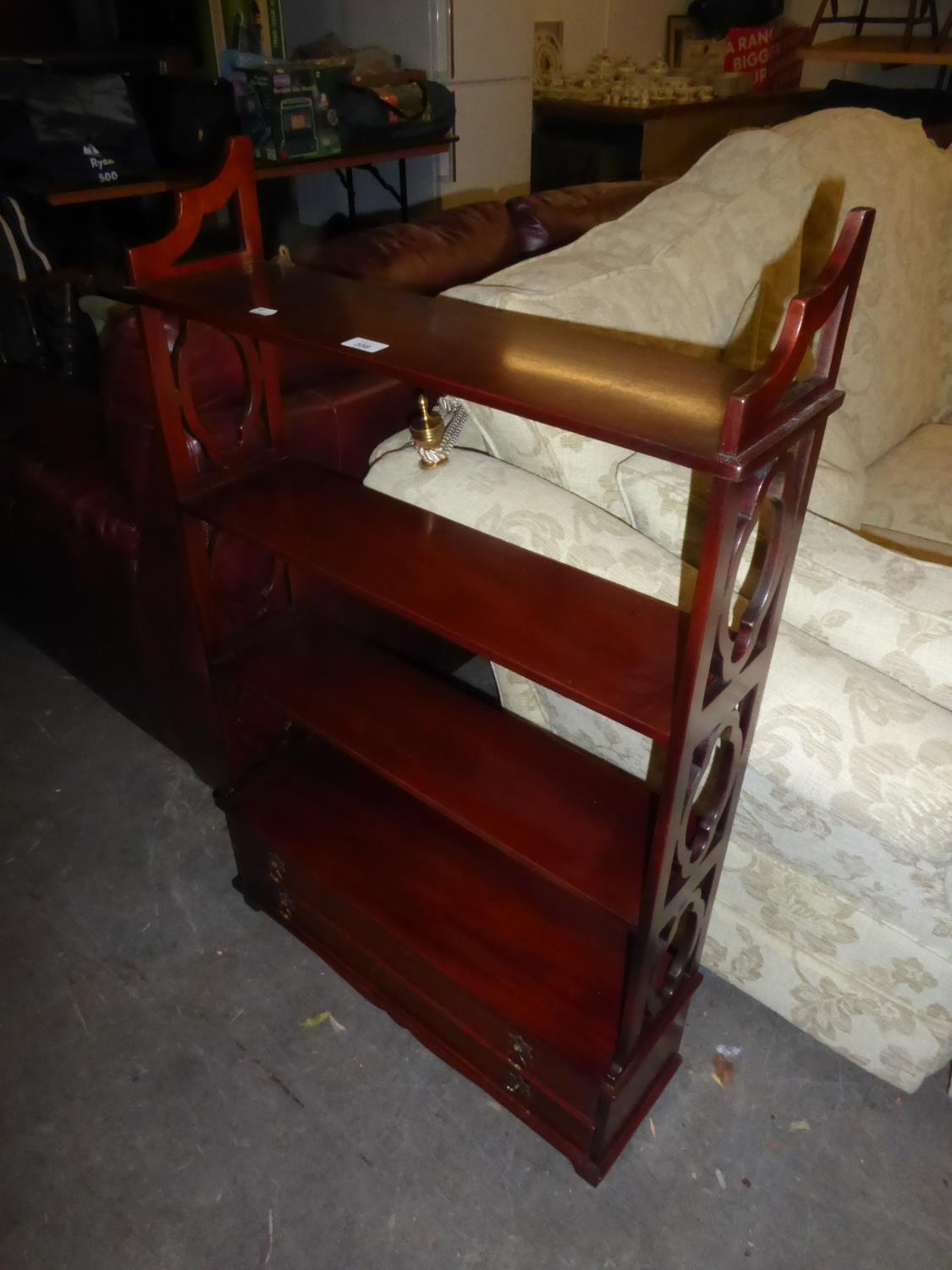 GEORGIAN STYLE MAHOGANY FOUR TIER OPEN BOOKCASE WITH OPEN-WORK SIDES AND ON BASE WITH TWO FULL WIDTH