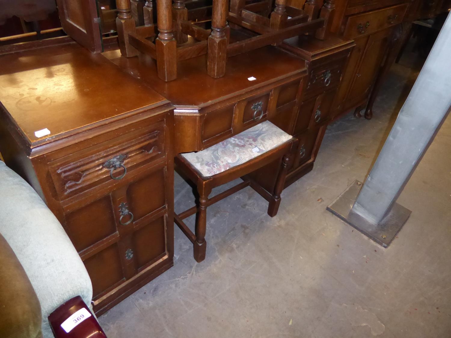 A LINEN FOLD CARVED OAK BEDROOM SUITE OF SIX PIECES, VIZ LADY’S AND GENT’S WARDROBES; A PEDESTAL - Image 2 of 3