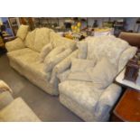 WINGED LOUNGE SUITE OF THREE PIECES, VIZ A THREE SEATER KNOLL SETTEE AND A PAIR OF LOUNGE CHAIRS,