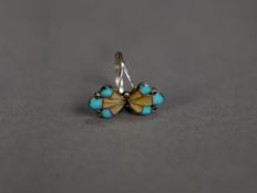 STERLING SILVER BUTTERFLY RING, the wings each of three sections, yellow enamelled with turquoise