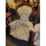 VICTORIAN STYLE EASY ARMCHAIR, WITH CARVED MAHOGANY SHOW WOOD FRAME, COVERED IN WHITE ON GREY