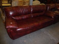 A LOUNGE SUITE OF TWO PIECES COVERED IN TAN LEATHER, VIZ A THREE SEATER SETTEE AND A TWO SEATER