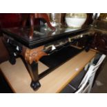 CHINESE BLACK LACQUERED OBLONG COFFEE TABLE, PAINTED WITH TERRACE SCENE AND HAVING FIVE CARVED