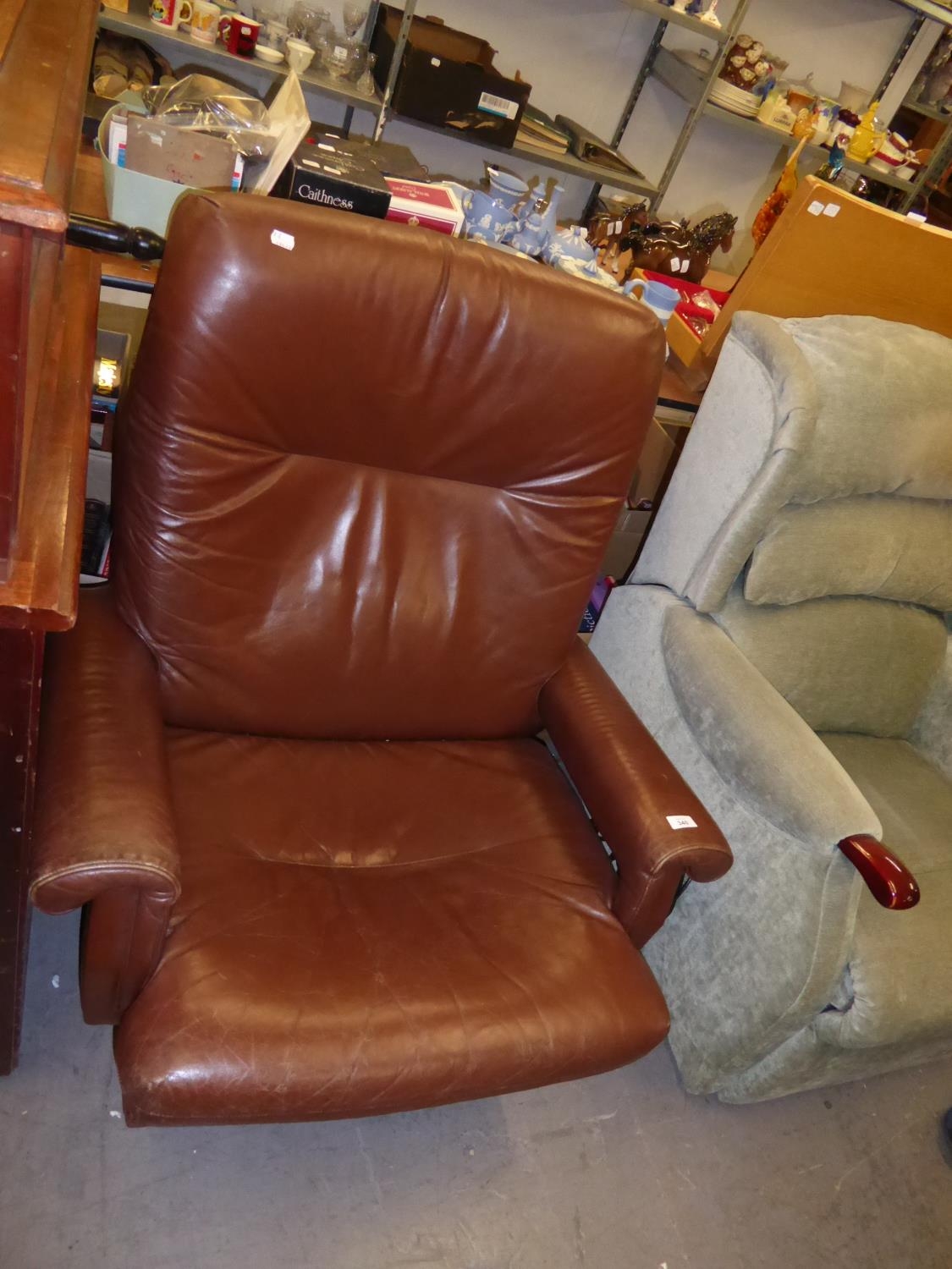 HK DESIGNS HIGH BACK JL EASY ARMCHAIR IN BROWN LEATHER WITH FOUR SPUR CHROME SWIVEL BASE