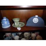 A WEDGWOOD BLUE JASPERWARE MANTEL CLOCK, TWO PIECES of WEDGWOOD SAGE GREEN JASPERWARE, and A