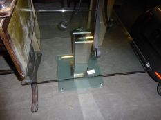 A COFFEE TABLE WITH PLATE GLASS SQUARE TOP, ON SQUARE BRIGHT STEEL COLUMN AND SQUARE FROSTED GLASS