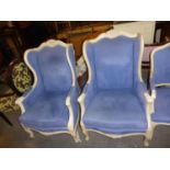 A PAIR OF SIMILAR WINGED EASY CHAIRS