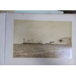 A large cloth bound photograph album, with a small selection of quality photographs 1910-1920,