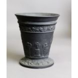 EARLY TWENTIETH CENTURY WEDGWOOD MOULDED BLACK BASALT VASE, of tapering form, decorated with