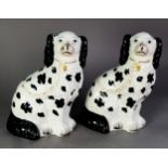 PAIR OF NINETEENTH CENTURY STAFFORDSHIRE POTTERY MANTLE DOGS, of typical form with gilt padlocked