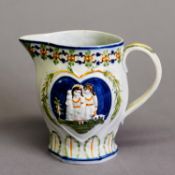 EARLY 1800s STAFFORDSHIRE PEARLWARE JUG, moulded in low relief and enamelled in Pratt colours with
