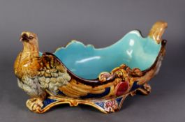 SARREGUEMINES, FRENCH MOULDED MAJOLICA POTTERY BOAT SHAPED DISH, modelled with eagles to the ends,